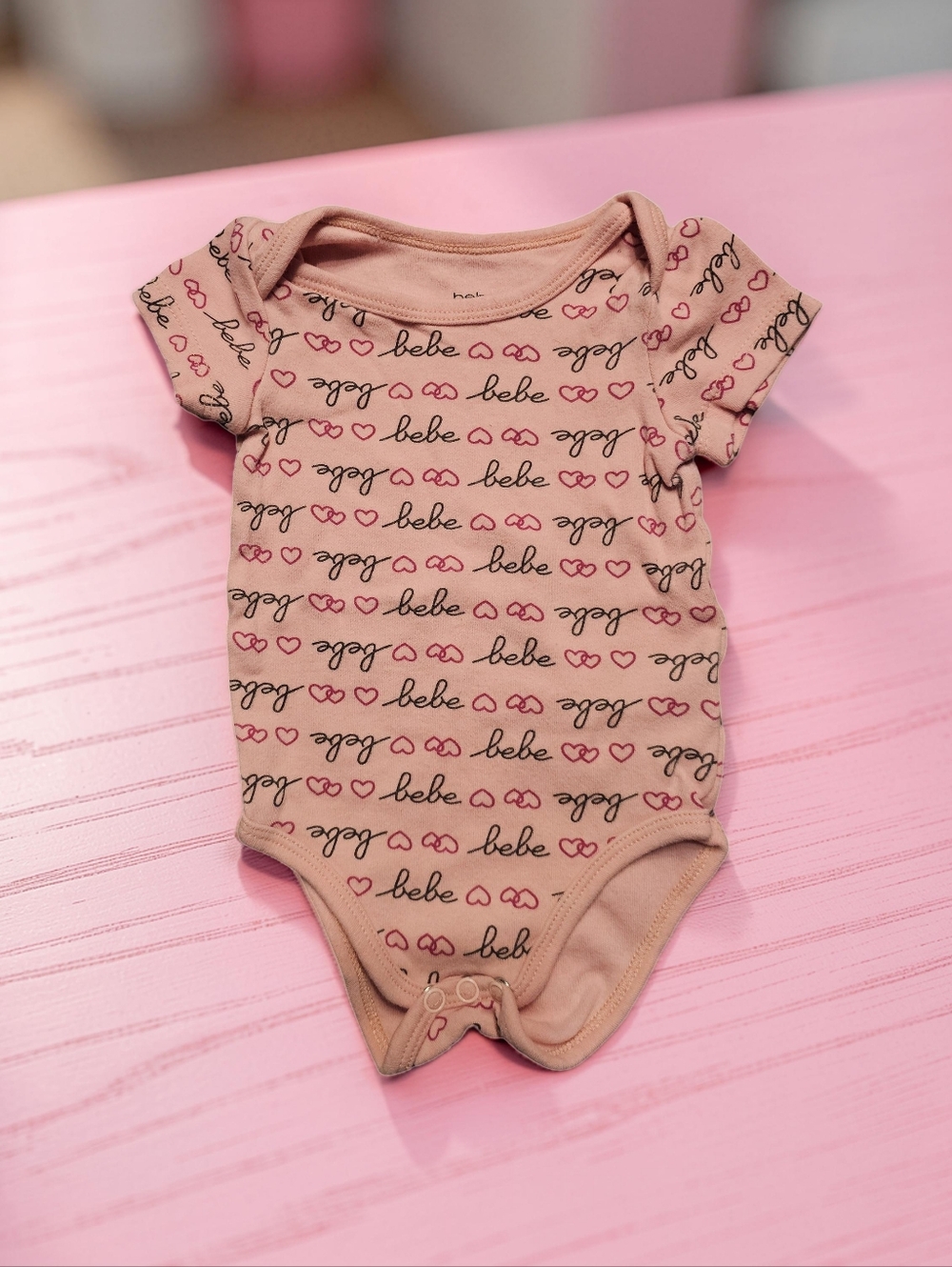 BEBE BABY Pink Script bebe & Heart Print One-Piece Bodysuit. Size 3-6mnths.